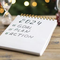 Notebook with 2024 resolution plan written down